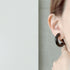 401. Big hoop earring