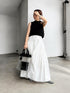 1096. compact volume knit vest