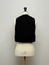 1096. compact volume knit vest