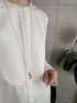 235. seed slider necklace