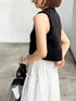 1096. compact volume knit vest