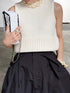1096. compact volume knit vest