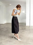 1096. compact volume knit vest