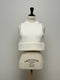1096. compact volume knit vest