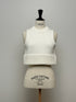 1096. compact volume knit vest