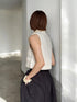 1096. compact volume knit vest