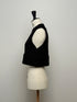 1096. compact volume knit vest