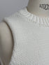 1096. compact volume knit vest