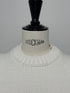 1096. compact volume knit vest