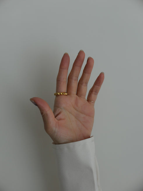 27. pyramid studs ring